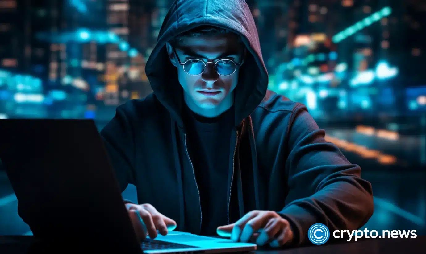 crypto-news-hacker-watch-on-his-laptop-blue-flame-on-the-screen-matrix-blue-program-code-Decentralization-blockchain-system-background02.webp